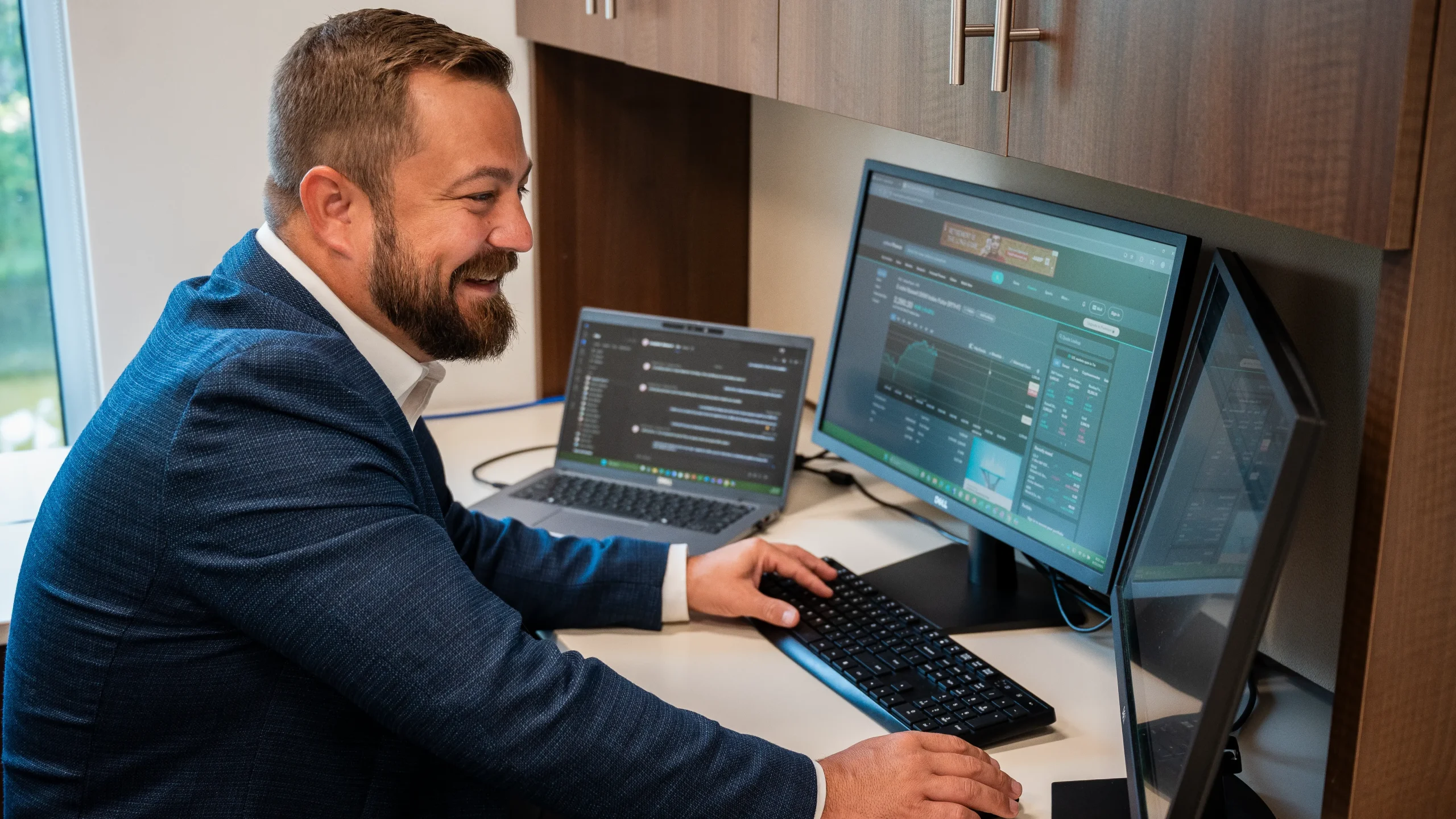 Employee at H&S Companies on computer
